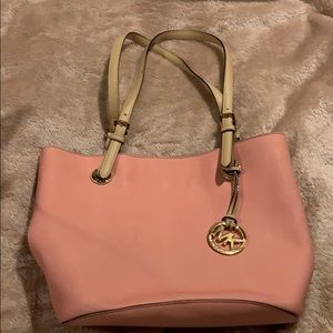 Michael Kors pink purse with tan leather straps